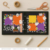 Boo To You scrapbook page kit shown in a memory album binder mockup with the finished two-page layout. A coordinated way to preserve Halloween memories and favorite photos.
