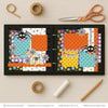Chills & Thrills scrapbook page kit shown in a memory album binder mockup with the finished two-page layout. A coordinated way to preserve spider Halloween memories and favorite photos.