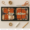 Happy Halloween scrapbook page kit shown in a memory album binder mockup with the finished two-page layout. A coordinated way to preserve vintage Halloween memories and favorite photos.