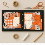 Spooky Fun scrapbook page kit shown in a memory album binder mockup with the finished two-page layout. A coordinated way to preserve Halloween memories and favorite photos.