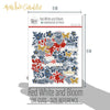 Red White and Bloom Die Cuts, size guide shown in hand for scale, showing pre-cut scrapbook embellishments for layouts, handmade cards, journals, mini albums, memory pages, and layered paper crafts. Buyer theme: Patriotic Floral Die Cuts & Ephemera. Red White and Bloom Die Cuts with navy and red flowers, leafy branches, gold butterflies, plaid hearts and Americana summer titles for layered scrapbook pages and keepsakes