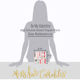Be My Valentine 6x6 Double-Sided Paper Pack, standing size guide image, showing 6x6 scrapbook paper for handmade cards, mini albums, junk journals, paper layering, small-scale layouts, and coordinated paper crafts. Buyer theme: Valentine 6x6 Paper for Cards & Mini Albums. Be My Valentine 6x6 Double-Sided Paper Pack with scaled hearts, plaids, gingham, XOXO blocks, flowers, bees, mailboxes and Valentine patterns for cards and mini albums