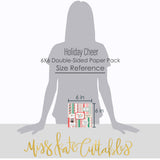 Holiday Cheer 6x6 Double-Sided Paper Pack, standing size guide image, showing 6x6 scrapbook paper for handmade cards, mini albums, junk journals, paper layering, small-scale layouts, and coordinated paper crafts. Buyer theme: Christmas 6x6 Scrapbook Paper for Cards & Mini Albums. Holiday Cheer 6x6 Double-Sided Paper Pack with scaled snowflakes, Santa, gingerbread, candy canes, ornaments, plaids, lights and festive Christmas patterns for cards and mini albums