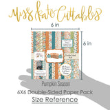 Pumpkin Season 6x6 Double-Sided Paper Pack, size guide shown in hand for scale, showing 6x6 scrapbook paper for handmade cards, mini albums, junk journals, paper layering, small-scale layouts, and coordinated paper crafts. Buyer theme: Fall 6x6 Scrapbook Paper for Cards & Mini Albums. 6x6 double-sided fall scrapbook paper pack with scaled pumpkin, plaid, botanical, and cozy autumn designs. Visible artwork includes pie slices, sweaters, blankets, autumn leaves