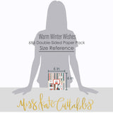Warm Winter Wishes 6x6 Double-Sided Paper Pack, standing size guide image, showing 6x6 scrapbook paper for handmade cards, mini albums, junk journals, paper layering, small-scale layouts, and coordinated paper crafts. Buyer theme: Winter 6x6 Paper for Cards & Mini Albums. Warm Winter Wishes 6x6 Double-Sided Paper Pack with scaled winter plaids, snowflakes, trees, berries, cabins, snowmen and cozy cold-weather patterns. Designed for Cold-weather journals, Card making, Mini albums