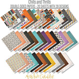 Chills and Thrills Basic monthly box. 12x12 Paper & Sticker Kit spread out with coordinated Halloween papers and stickers.